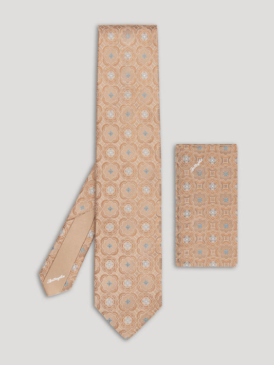 Brown and beige tie with large pattern and matching handkerchief
