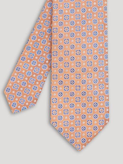 Orange and blue silk tie with large pattern