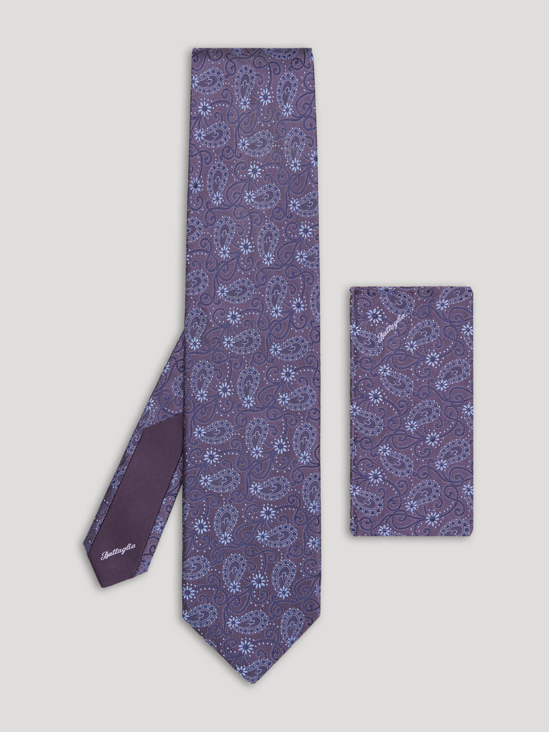 Purple paisley tie with matching handkerchief.