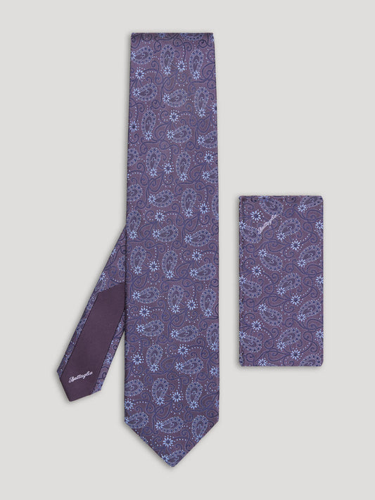 Purple paisley tie with matching handkerchief. 