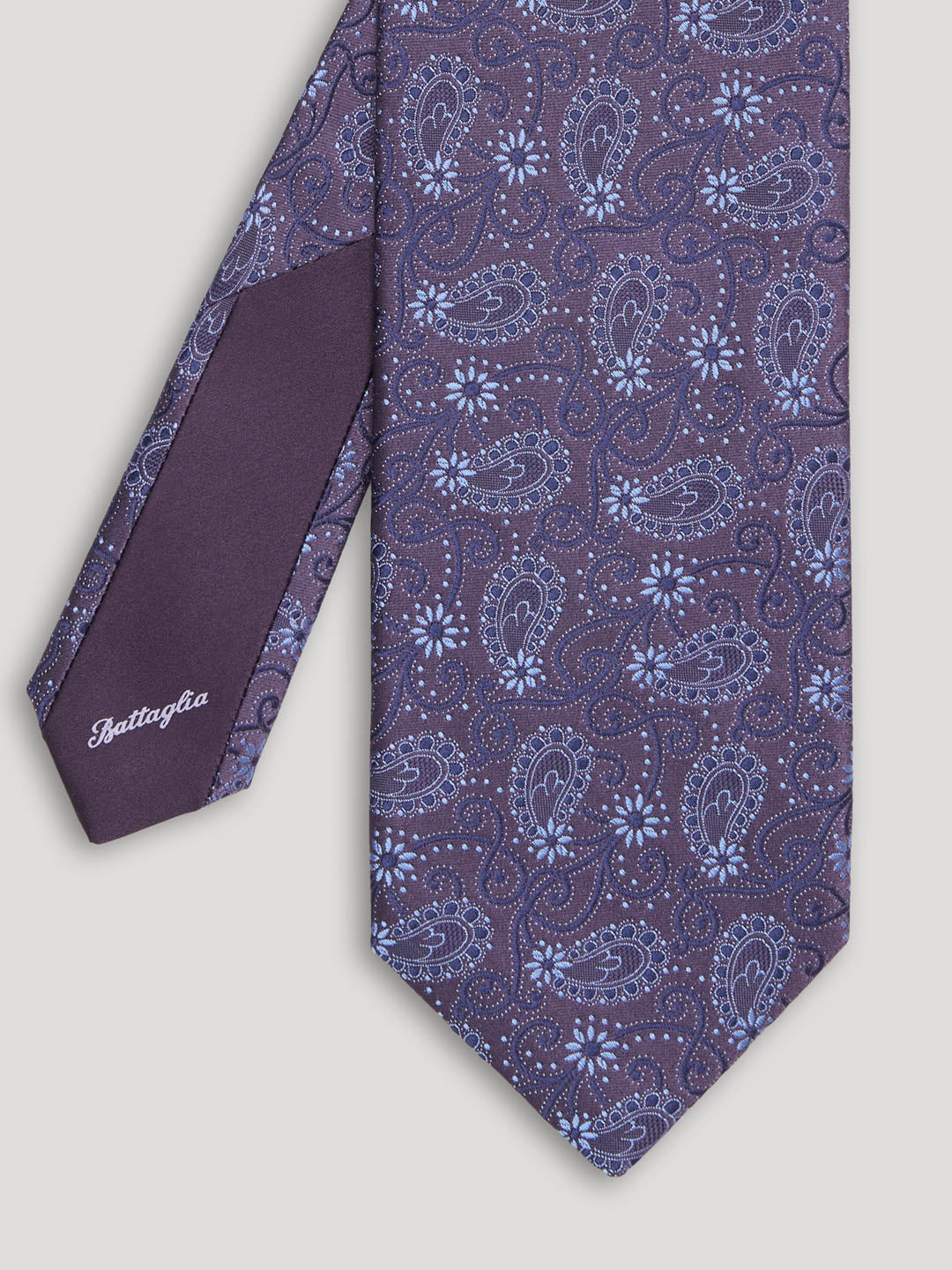 Purple paisley tie.