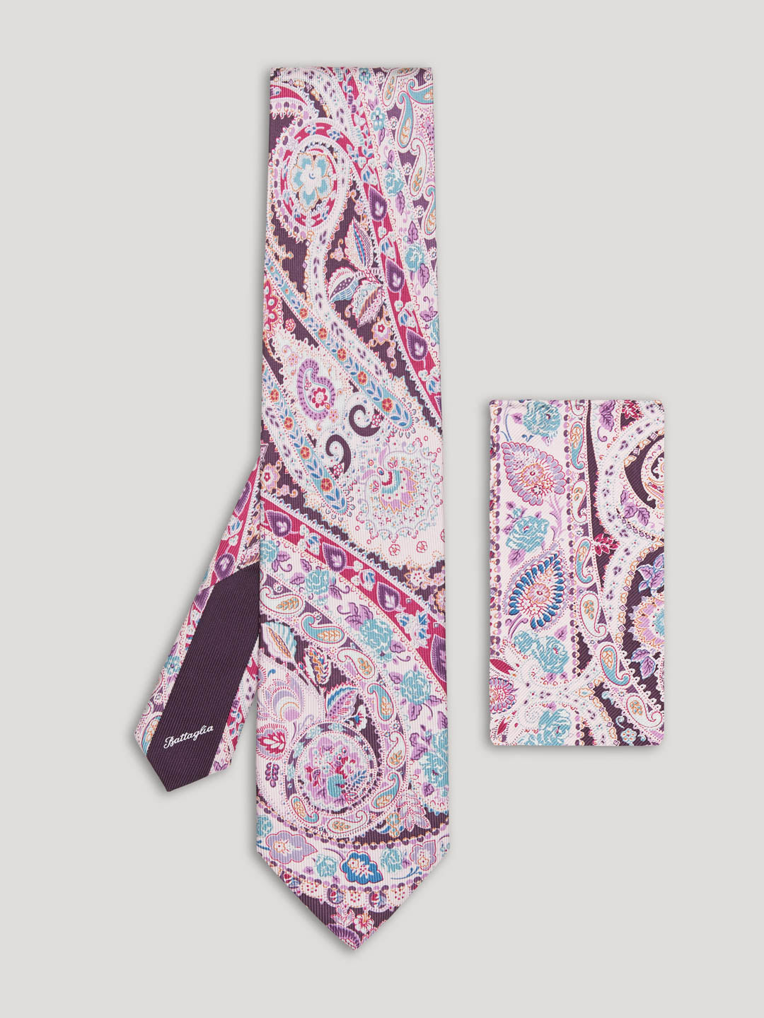Purple and pink paisley tie with matching handkerchief.