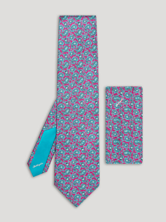 Electric blue and pink paisley tie with matching handkerchief.