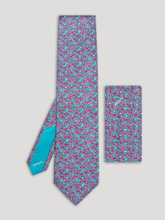 Electric blue and pink paisley tie with matching handkerchief. 
