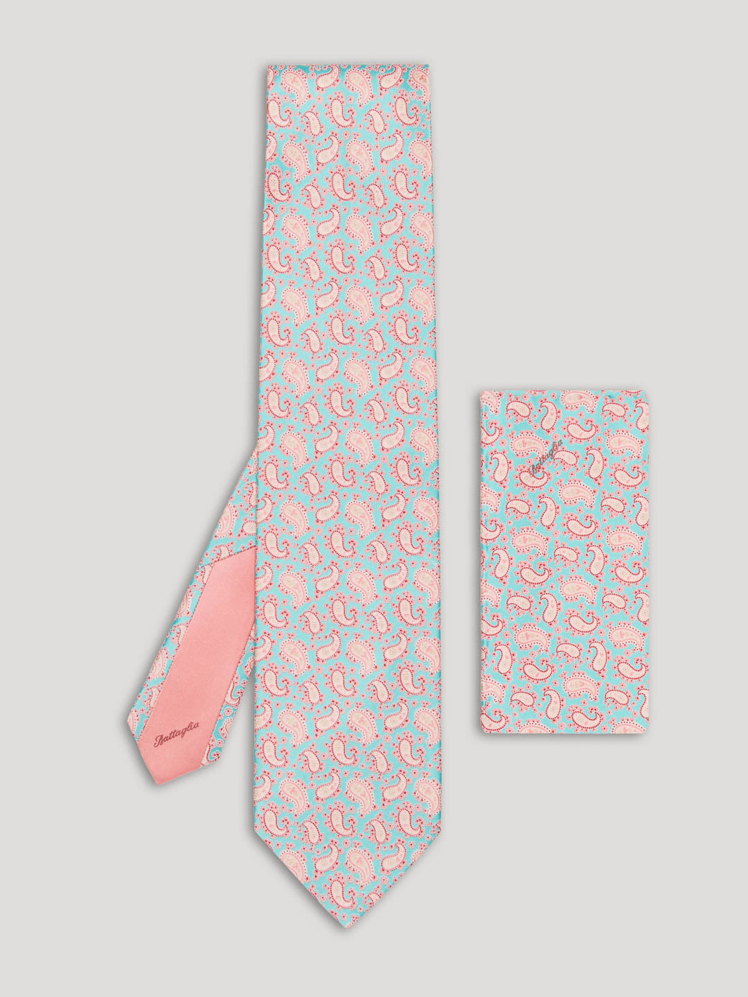 Baby pink and light blue paisley tie with matching handkerchief.
