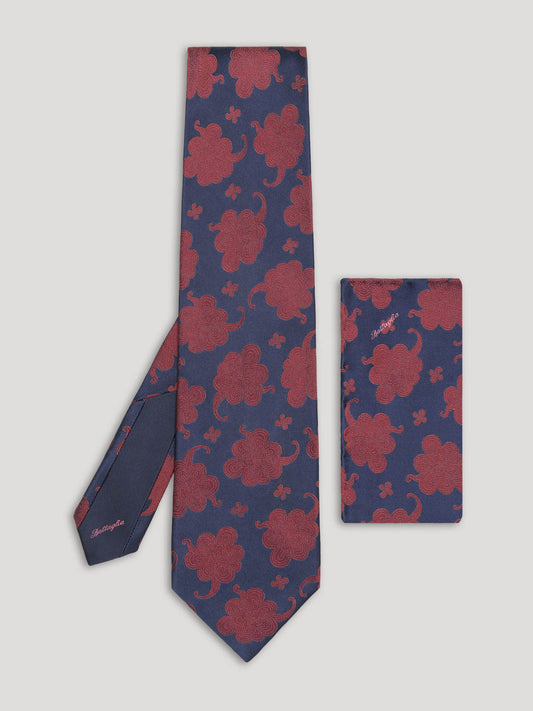 Navy and red paisley tie with matching handkerchief.