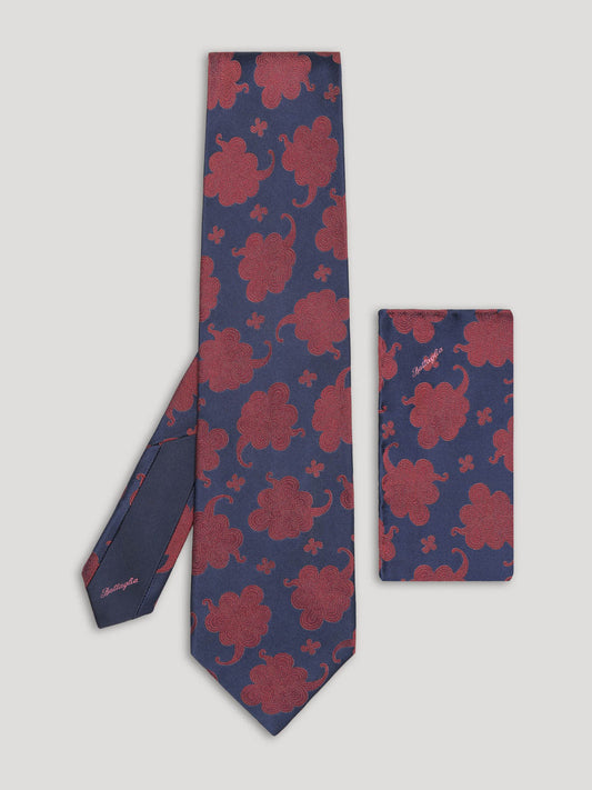 Navy and red paisley tie with matching handkerchief. 