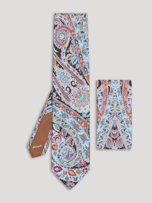 Blue and brown paisley tie with matching handkerchief.