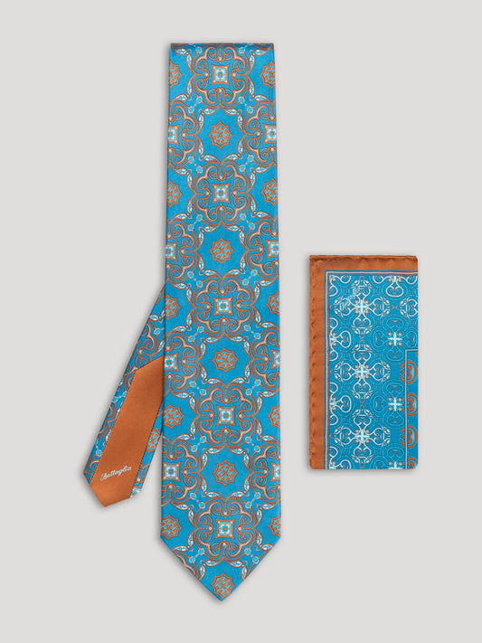 Turquoise and brown paisley tie with matching handkerchief.