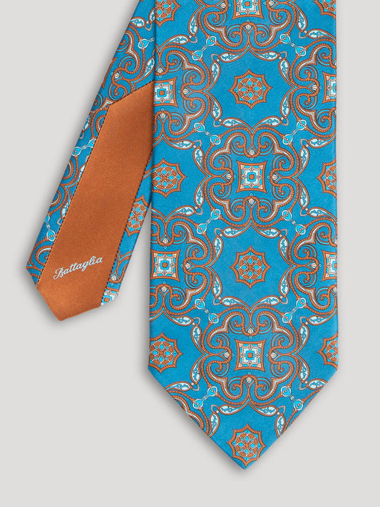 Turquoise and brown paisley tie.