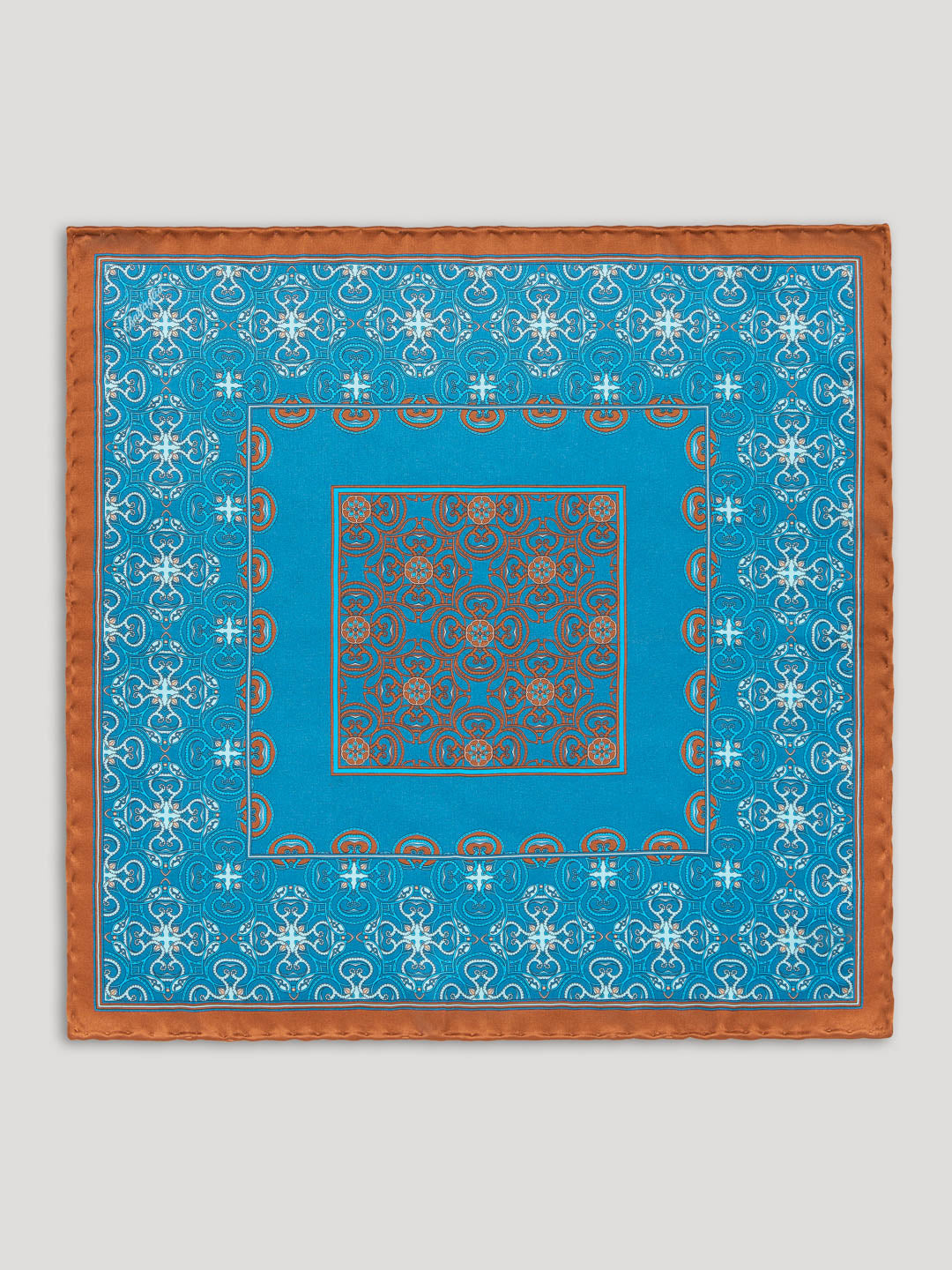 Turquoise and brown paisley handkerchief.