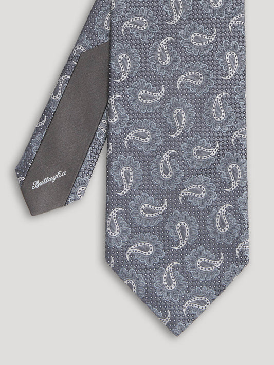 Grey paisley tie.