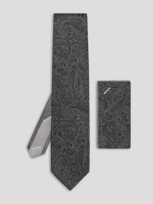Black paisley tie with matching handkerchief.