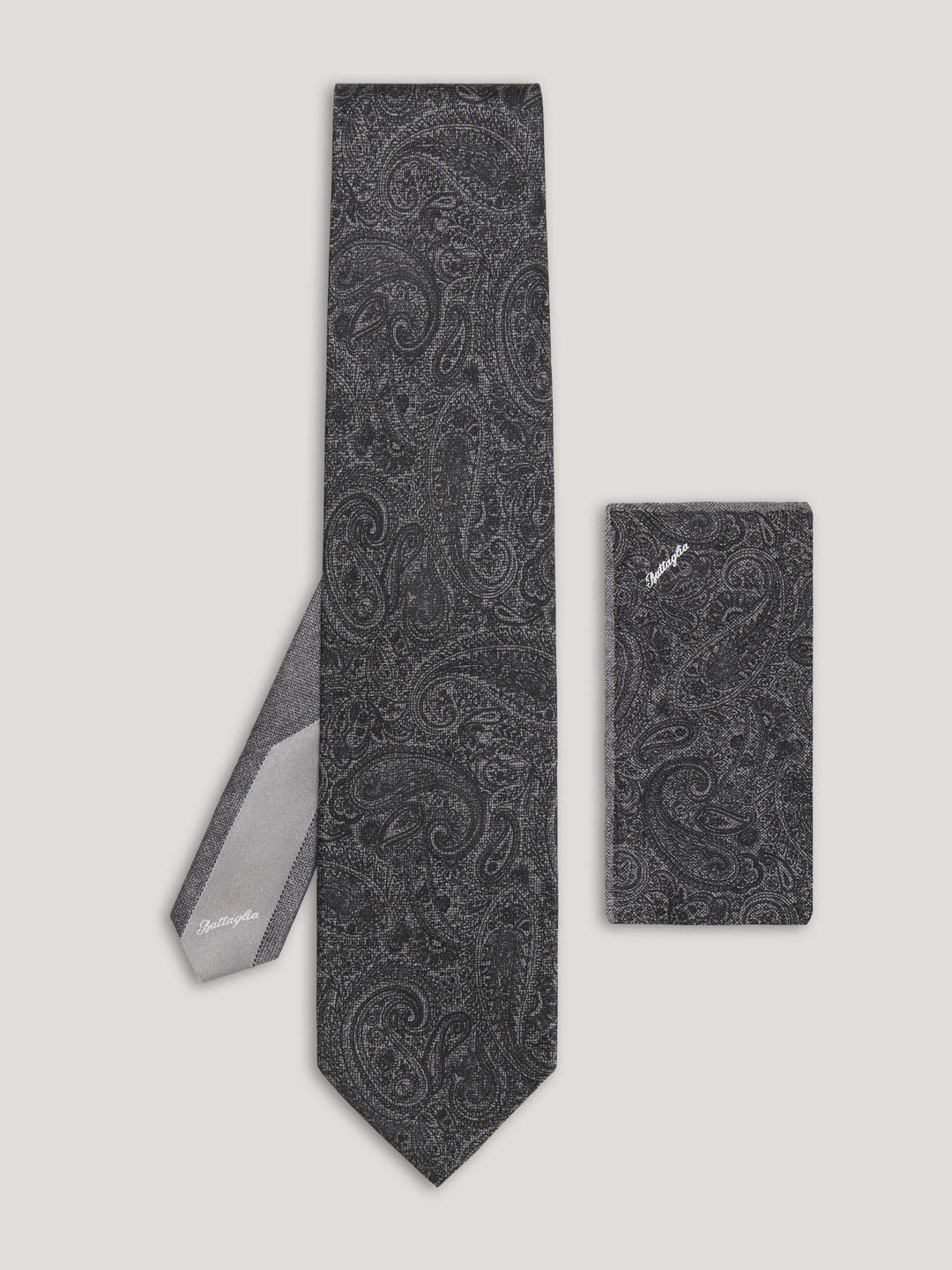 Black paisley tie with matching handkerchief. 