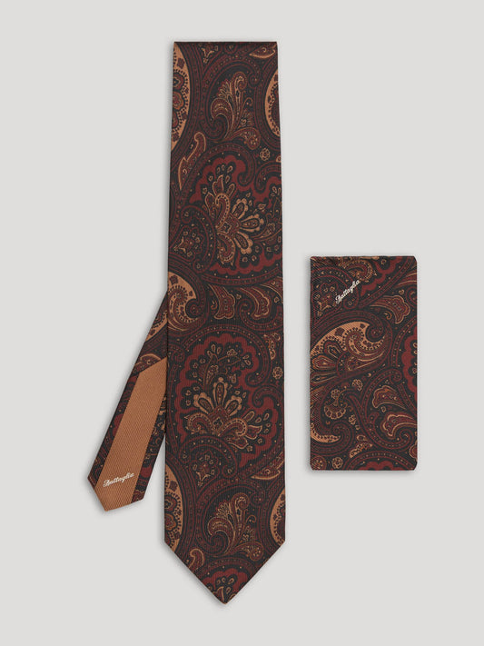 Burgundy paisley tie with matching handkerchief.
