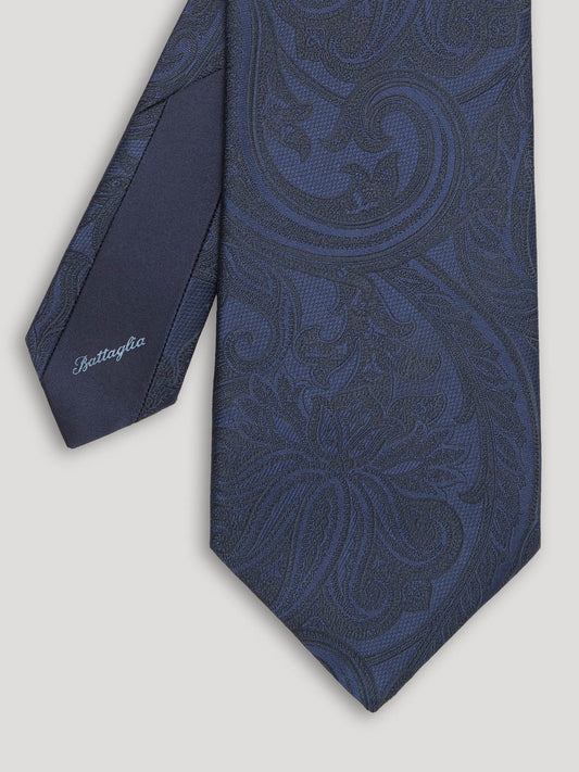 Blue paisley silk tie.
