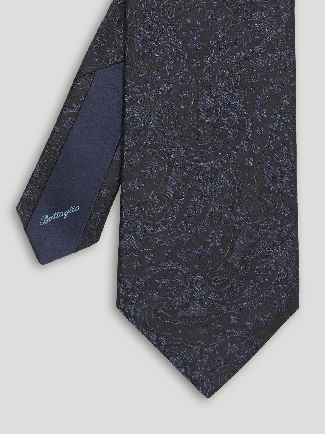 Blue and black silk paisley tie.
