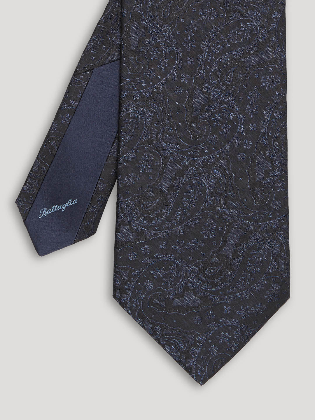 Blue and black silk paisley tie. 