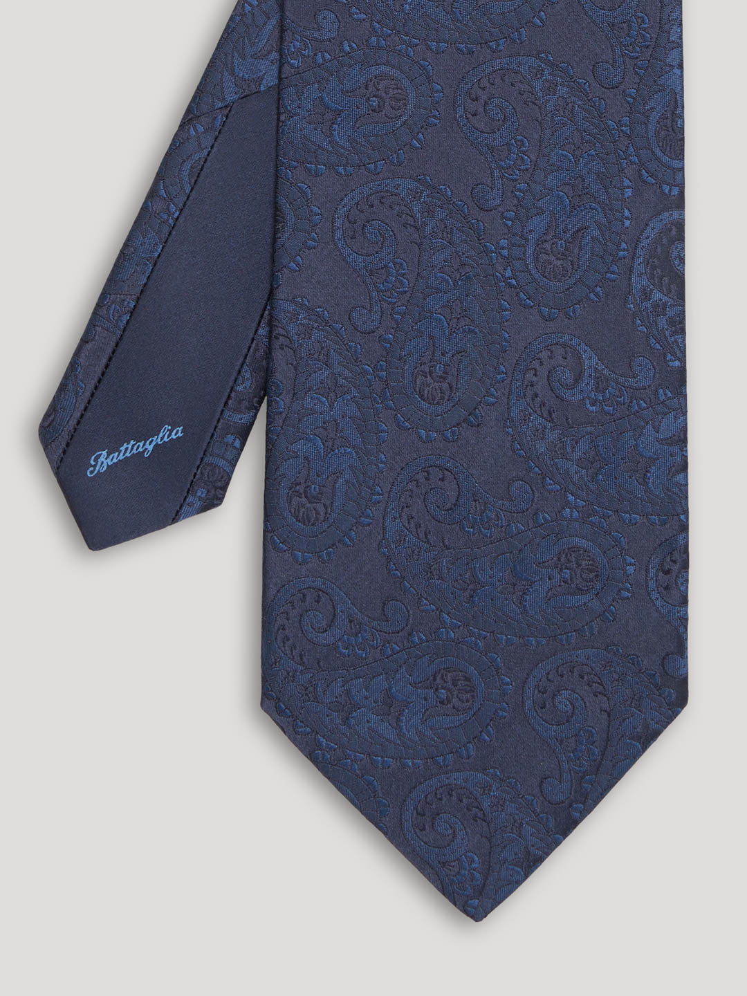 Blue paisley silk tie.