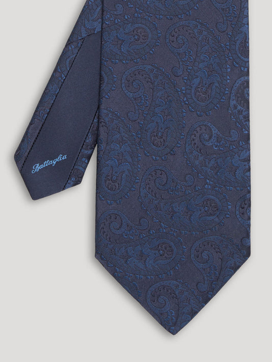 Blue paisley silk tie.