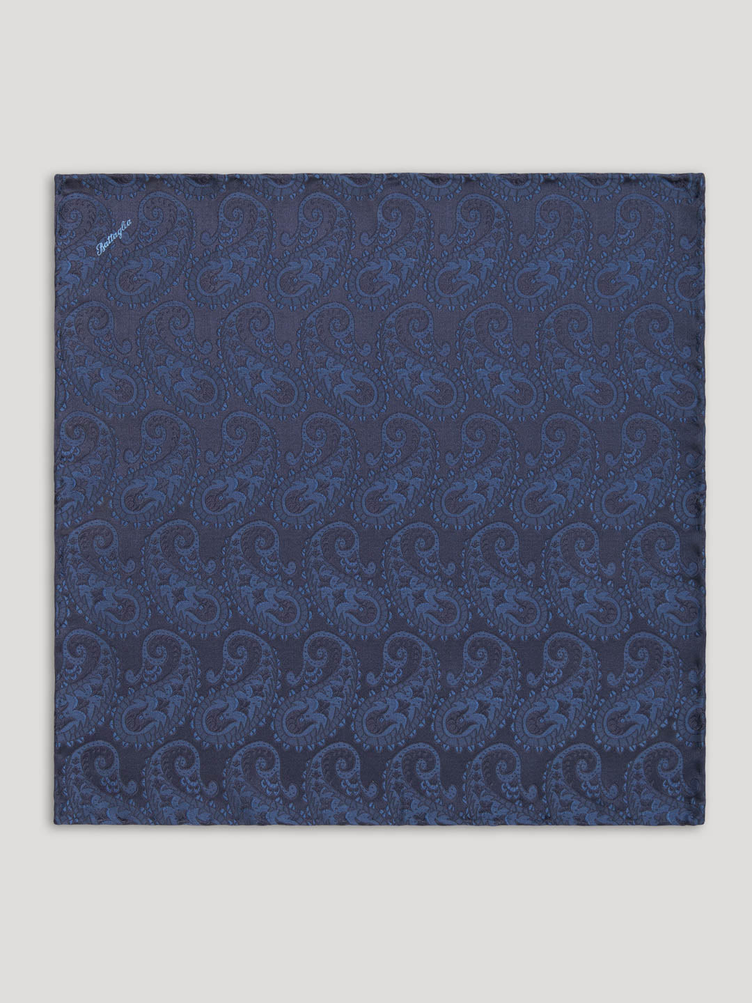 Blue paisley silk handkerchief.