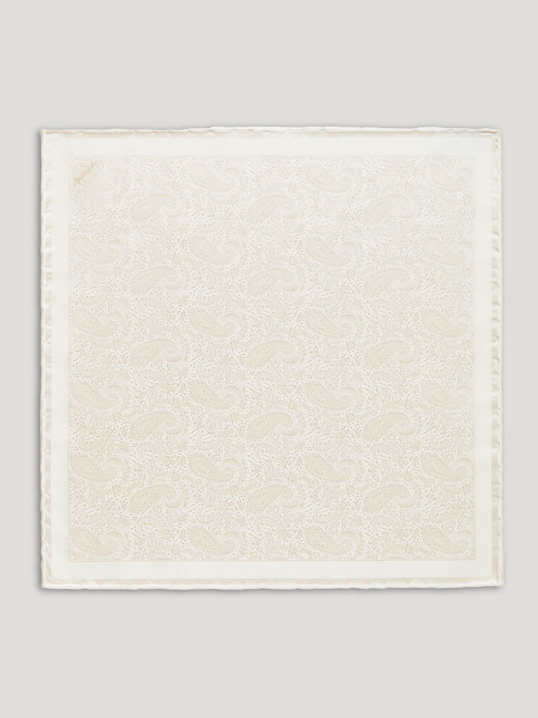 Cream white paisley silk handkerchief.