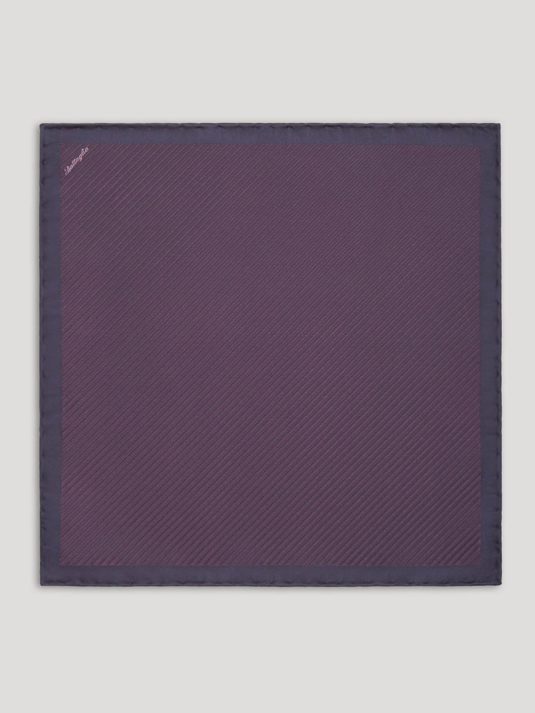 Deep purple handkerchief with small white polkadots. 