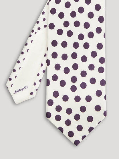 White tie with large purple polkadots. 