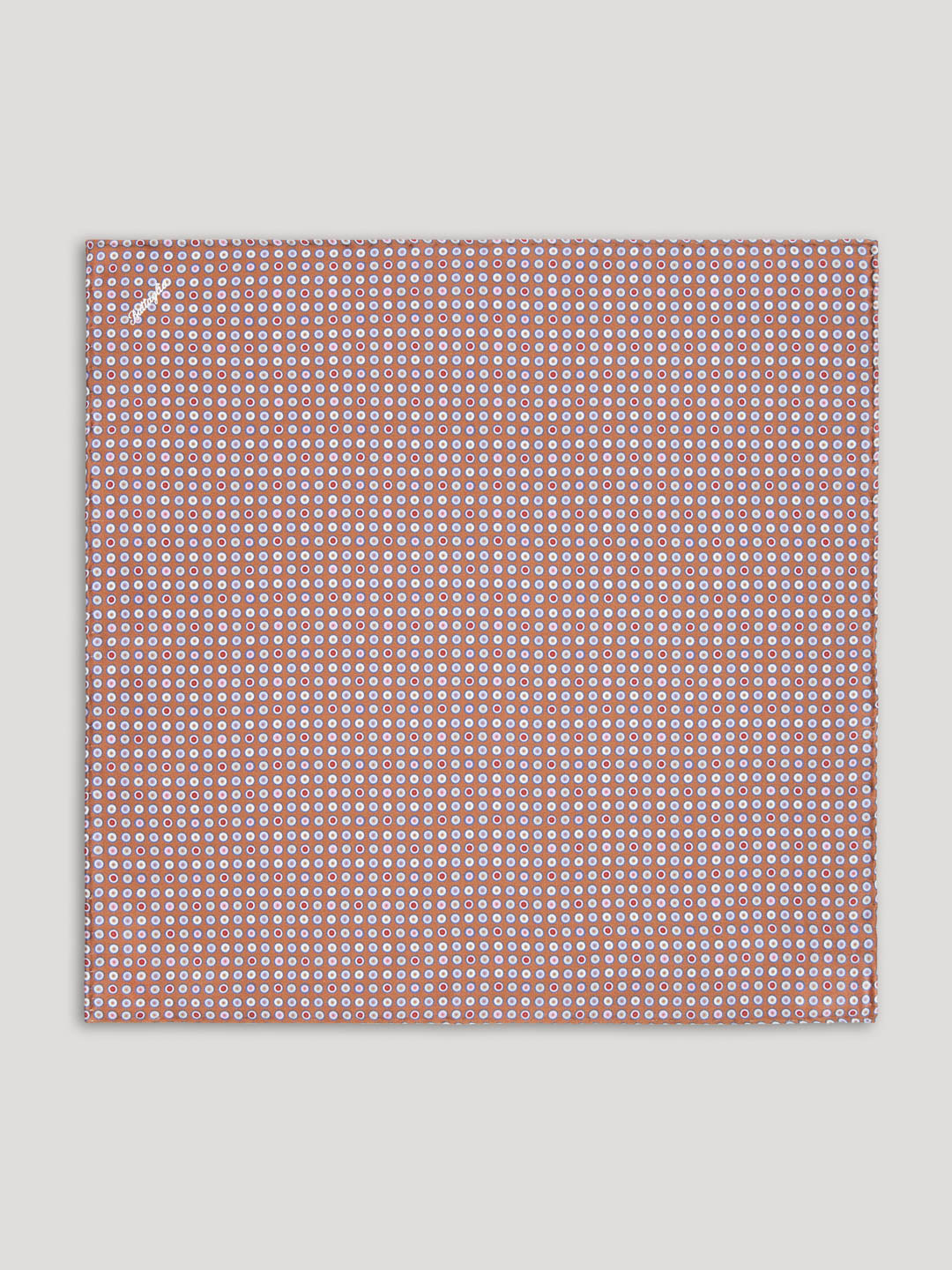 Brown handkerchief with multi colored polkadots.