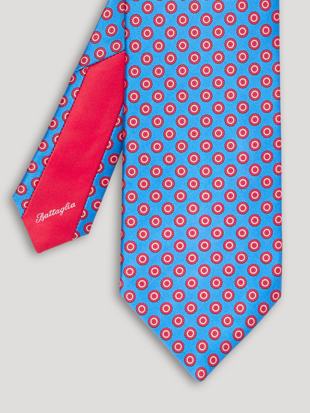 Blue tie with red polkadots. 