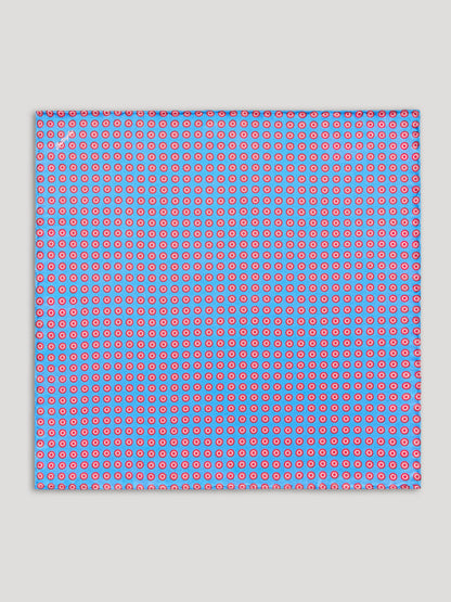 Blue handkerchief with red polkadots. 