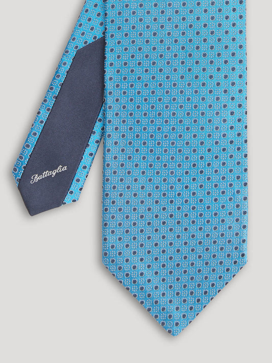 Blue tie with navy polkadots.