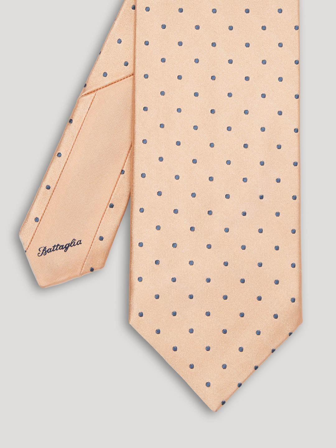 Pink tie with grey polkadots. 
