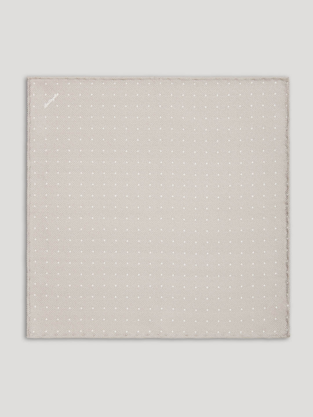 Light gray handkerchief with white polkadots.