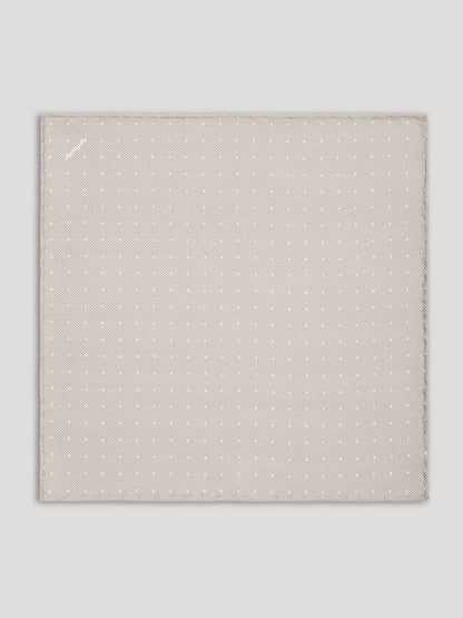 Light gray handkerchief with white polkadots. 