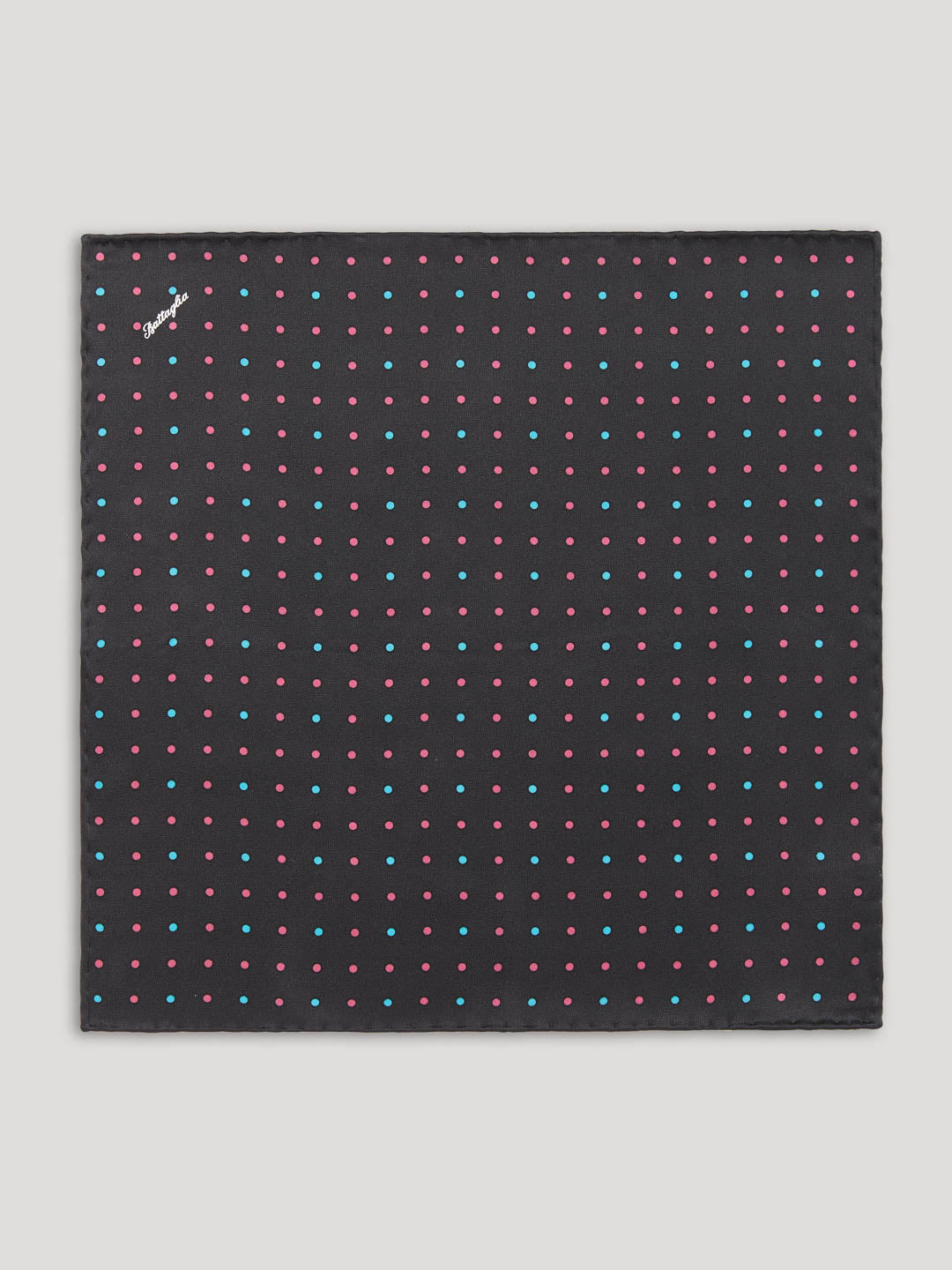 Black handkerchief with pink and blue polkadots.