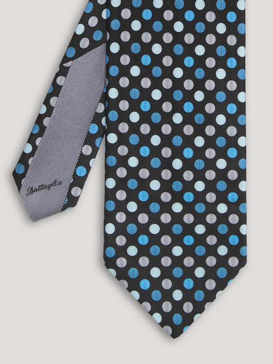 Black tie with blue and gray polkadots.