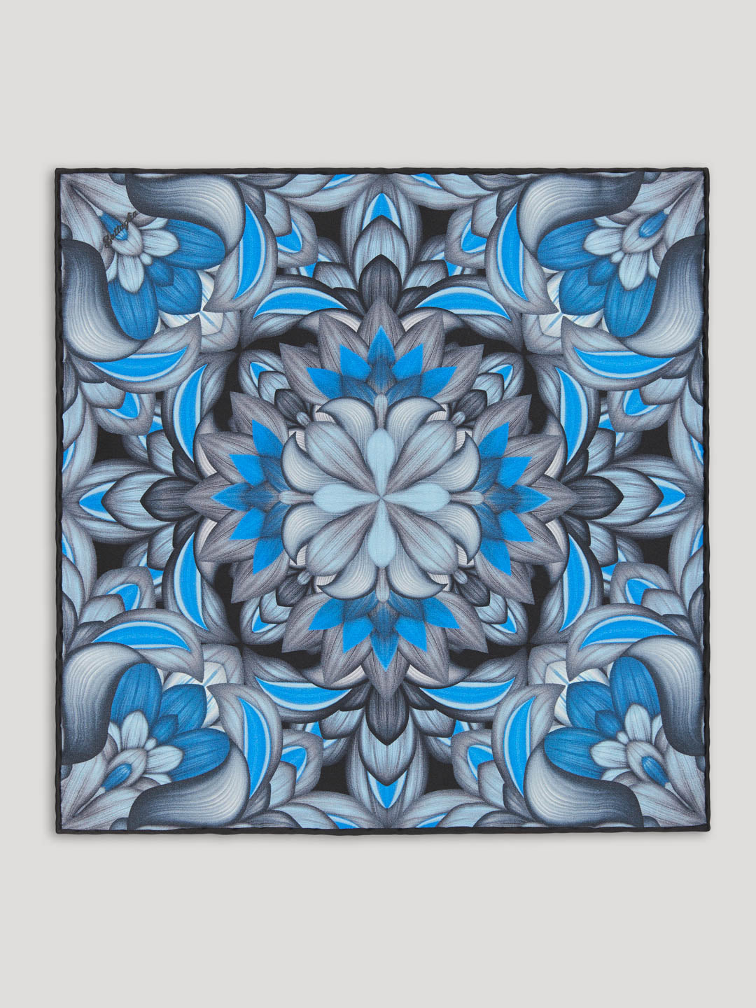 Black, blue, and gray handkerchief with intricate floral design.