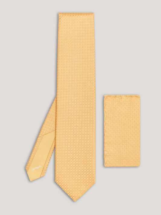 Yellow tone on tone small pattern tie with matching handkerchief.