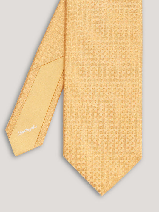 Yellow tone on tone small pattern tie.