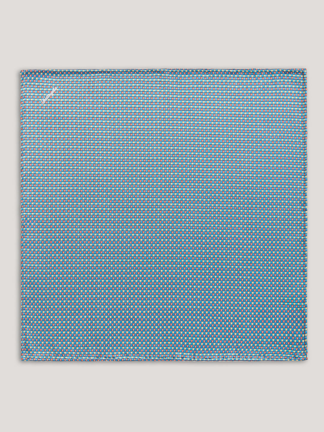 Blue handkerchief with small pattern design.
