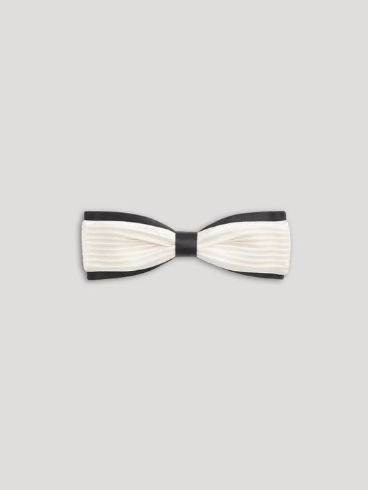 Black and white pleated bow tie. 