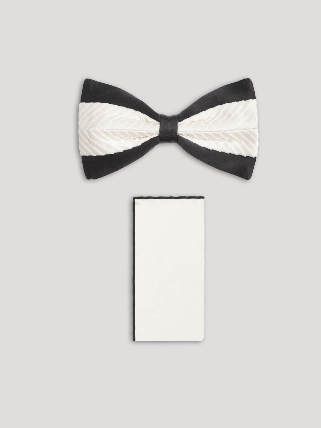 White and black silk bowtie with matching handkerchief