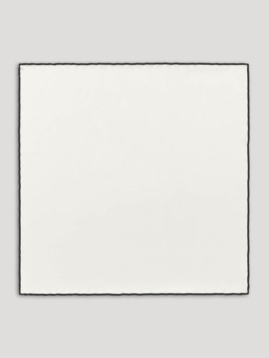 White silk handkerchief with black border.