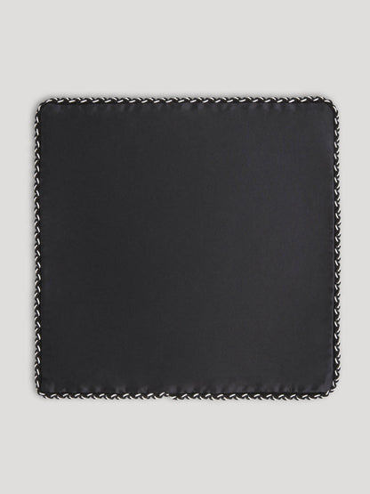Black handkerchief with white and black weave border design. 