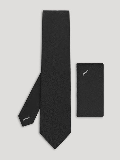 Black tone on tone paisley tie with matching handkerchief. 