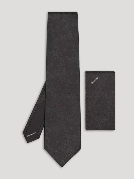 Black tone on tone silk tie with matching handkerchief. 