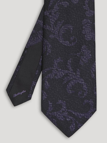 Black tie with floral design. 