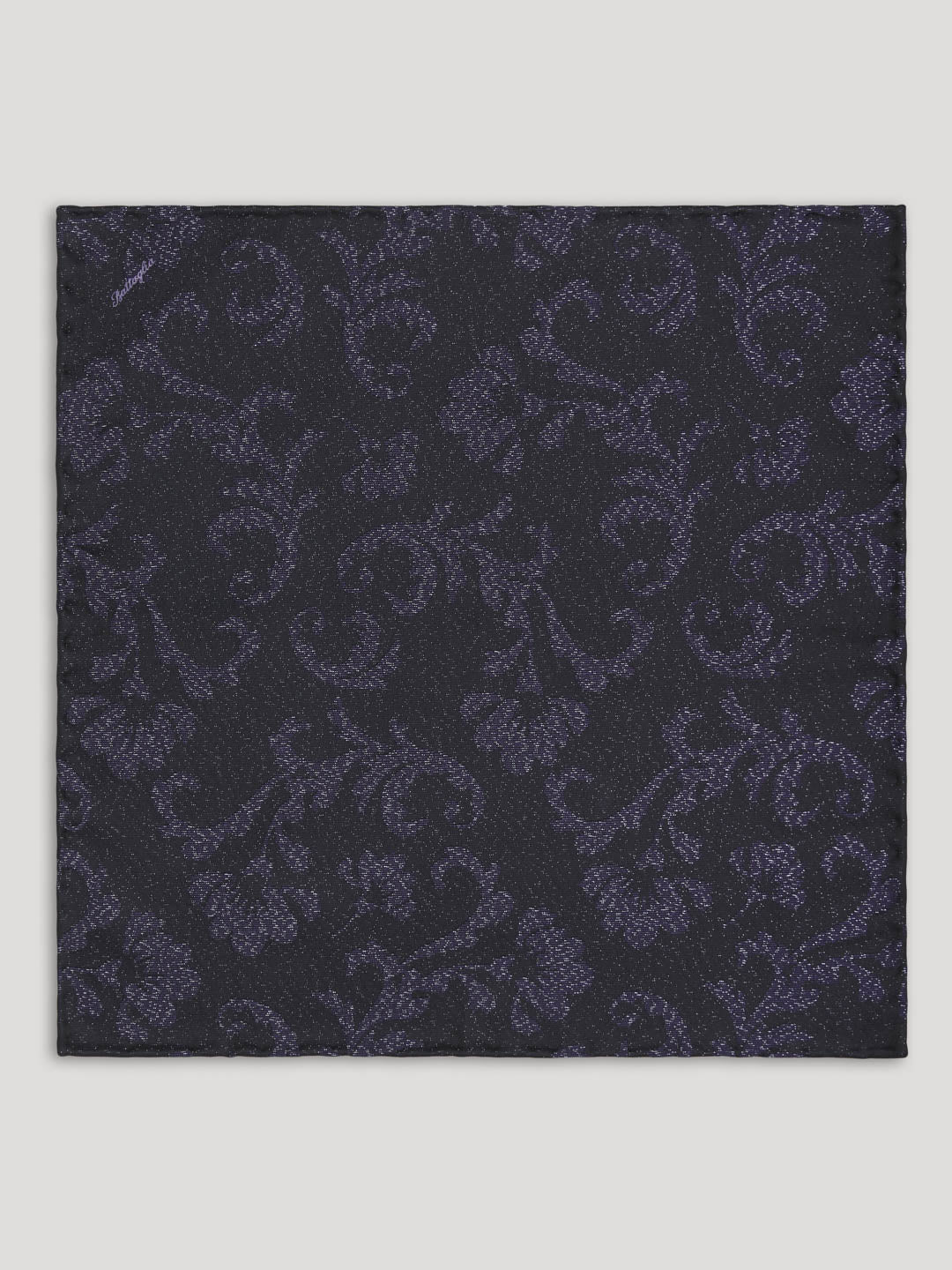 Black handkerchief with floral design.