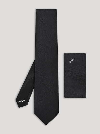 Black tie with black handkerchief. 
